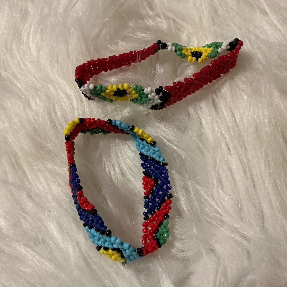 TWO beaded multi colored bracelets